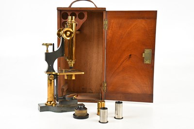 Lot 2462 - WATSON; a brass microscope, no. 3739, cased.