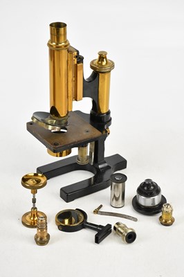 Lot 2458 - W WATSON & SONS LTD; a 'Praxis' microscope, no....