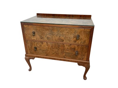 Lot 2212 - A reproduction walnut chest of two drawers,...