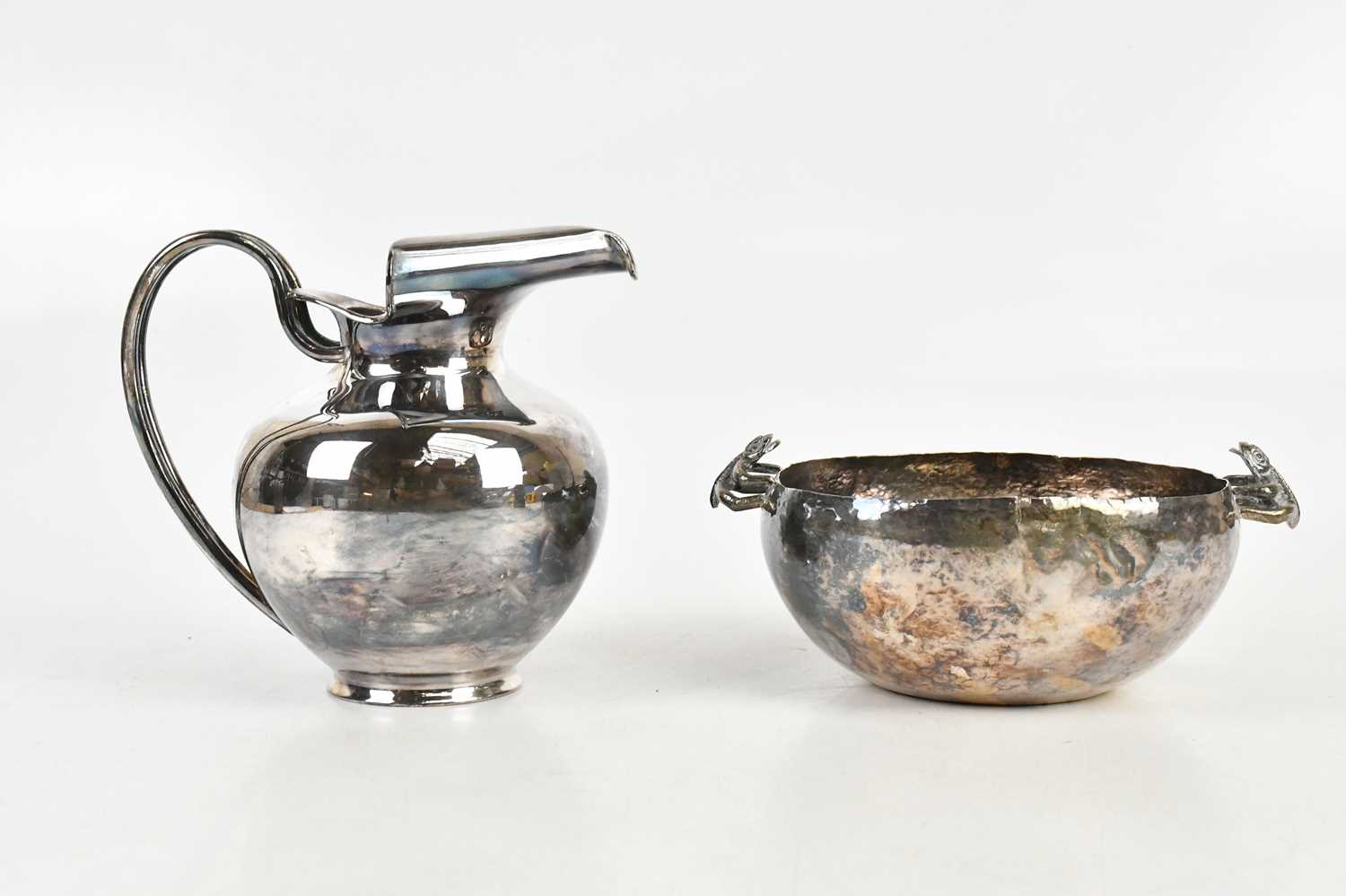 Lot 1460 - A Peruvian sterling silver water jug of...
