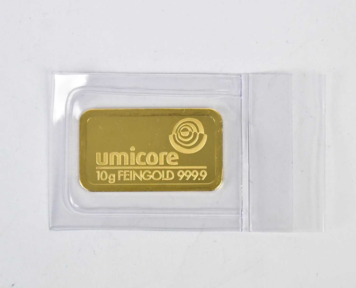 Lot 1141 - A Umicore 10g 24ct 999.9 gold ingot, 3.2 x 2cm.