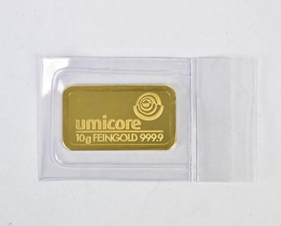 Lot 1141 - A Umicore 10g 24ct 999.9 gold ingot, 3.2 x 2cm.