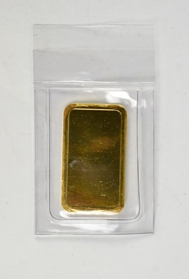 Lot 1141 - A Umicore 10g 24ct 999.9 gold ingot, 3.2 x 2cm.