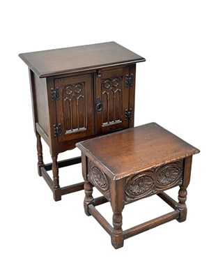 Lot 2234 - A reproduction Priory style twin door cupboard,...