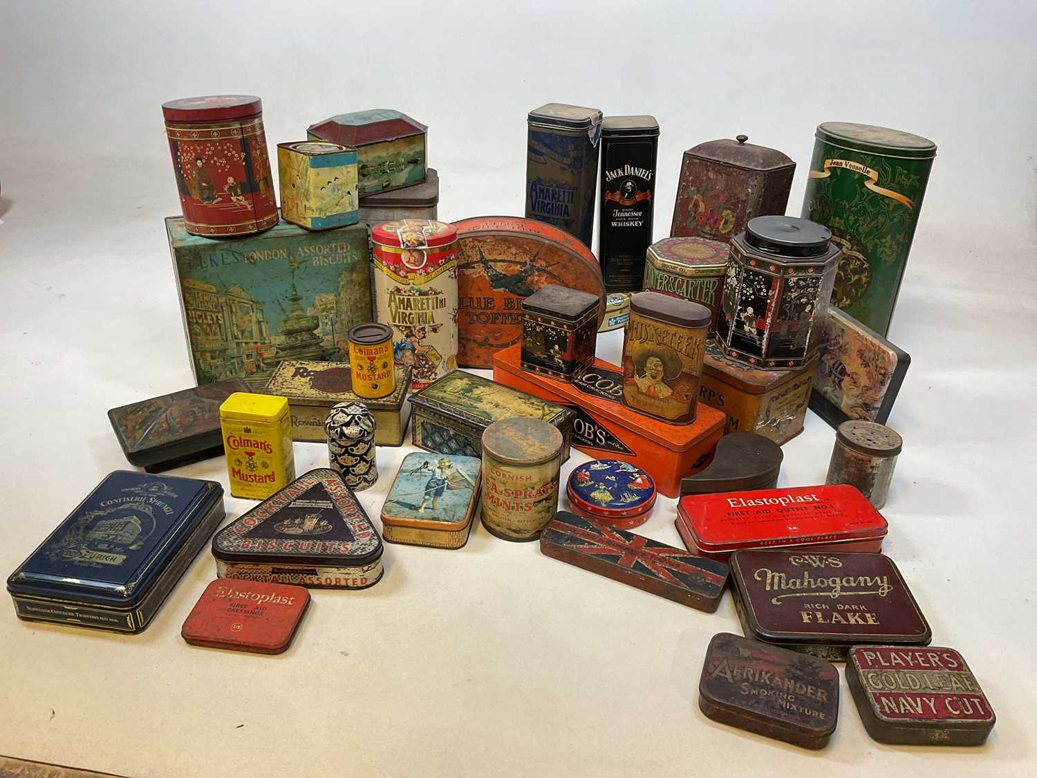 Lot 84 - A large collection of vintage tins, including