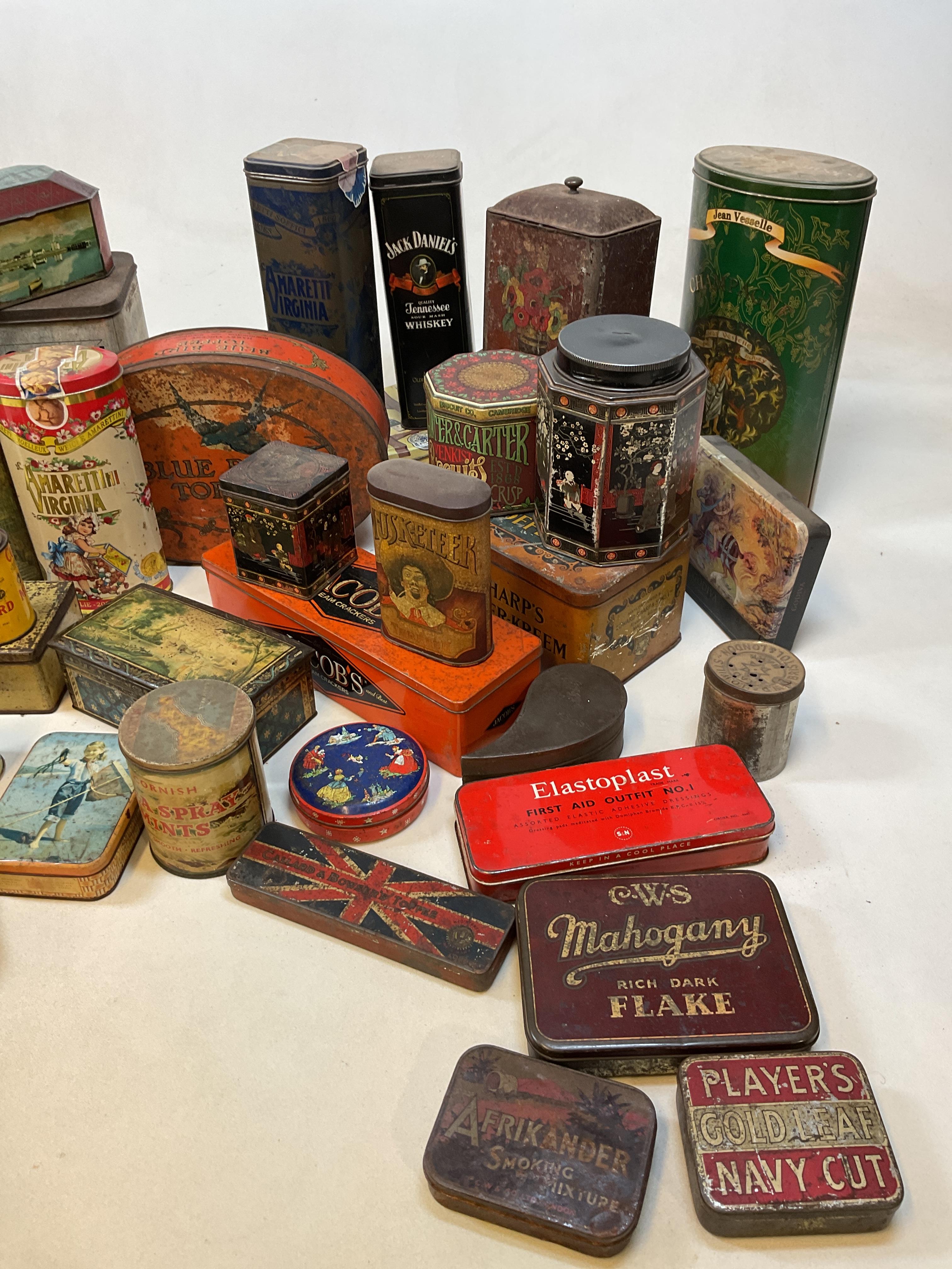 Lot 84 - A large collection of vintage tins, including