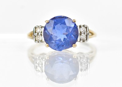 Lot 1342 - A 9ct yellow gold ring set with a round cut...