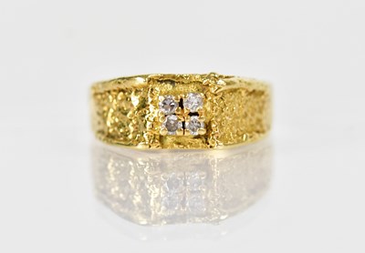 Lot 1286 - An 18ct yellow gold ring set with four...