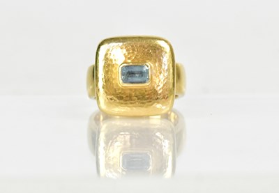 Lot An 18ct yellow gold ring set with central...