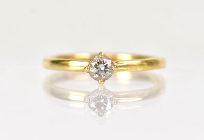 Lot 1264 - An 18ct yellow gold diamond solitaire ring,...