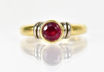 Lot 1280 - An 18ct yellow gold ring set with a central...