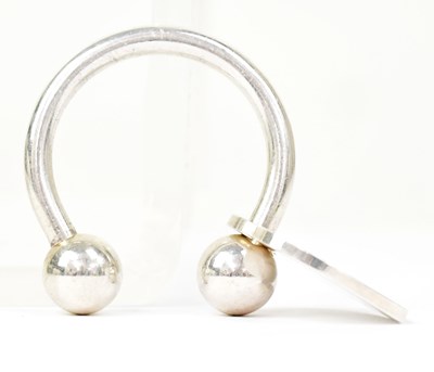 Lot 1499 - TIFFANY & CO; a silver key ring with...