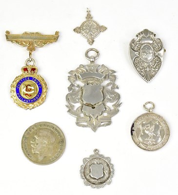 Lot 680 - A collection of hallmarked silver medals and...