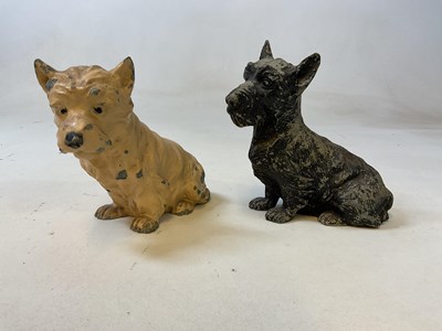 Lot 37 - A pair of painted Black & White spelter dogs,...