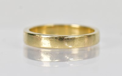 Lot 1320 - A 9ct yellow gold wedding band with hallmarks...