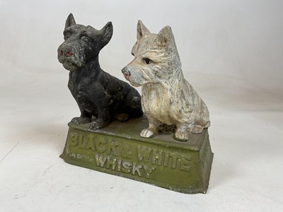 Lot 98 - An original spelter advertising Black & White...