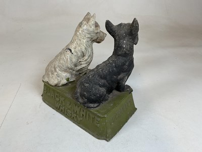 Lot 98 - An original spelter advertising Black & White...