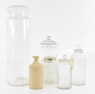 Lot 2379 - A small collection of glass jars, including a...