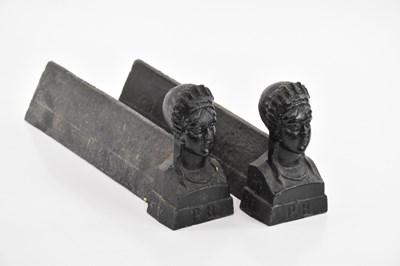 Lot 1576 - A pair of cast iron fire dogs, both modelled...