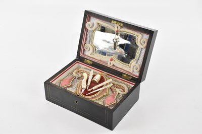 Lot 1500 - Possibly a Palais Royale ebonised and brass...