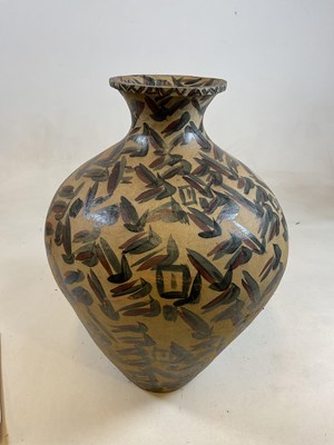 Lot 292 - A large studio pottery hand painted vase...