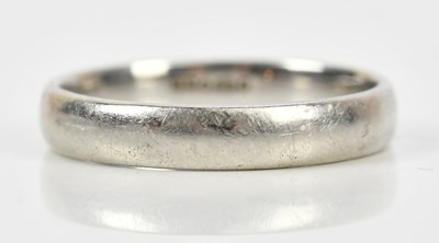 Lot 452 - A platinum wedding band, size X, approx 8.66g.