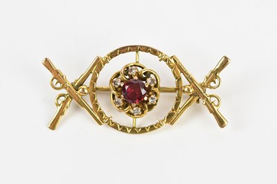 Lot 61 - An American yellow metal diamond and synthetic...