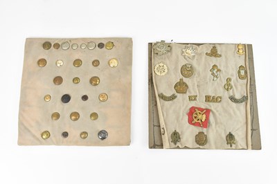 Lot 1268 - Two boards containing a collection of military...