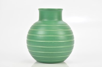 Lot 388 - KEITH MURRAY FOR WEDGWOOD; a green glazed...