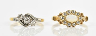 Lot 401 - A yellow metal diamond illusion crossover...