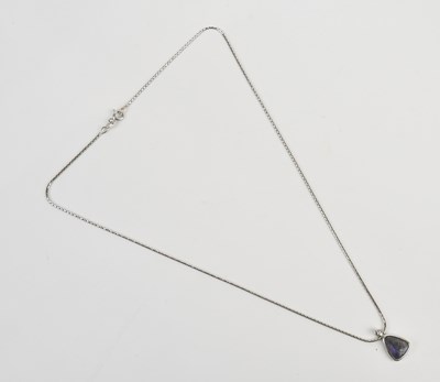 Lot 258 - A white metal mounted black opal and diamond...