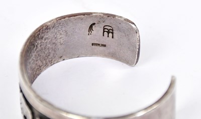 Lot 1427 - BEAUFORD DAWAHOYA (1938 - 1998); a Hopi silver...