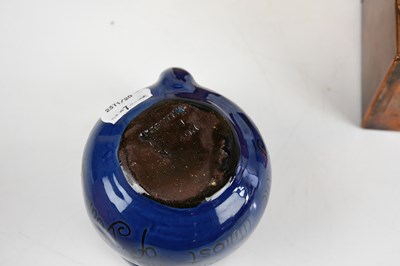 Lot 673 - BRANNAM; an Art Pottery puzzle jug, toegether...