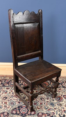 Lot 2998 - A 17th century oak single chair, height 103cms.