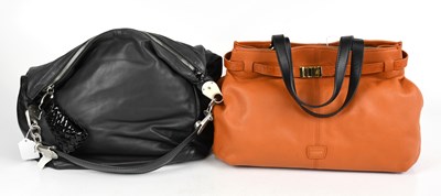 Lot 701 - JAEGER; an orange tan leather handbag trimmed...