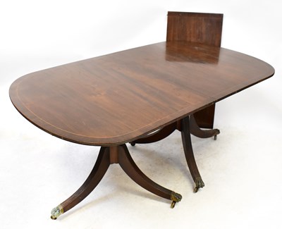 Lot 26 - A Georgian-style twin pedestal extending...