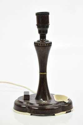 Lot 349 - An Art Deco bakelite table lamp with ashtray...