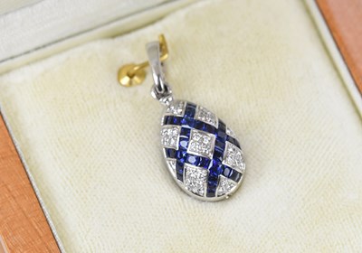 Lot 209 - FABERGÉ; a diamond and sapphire set white...