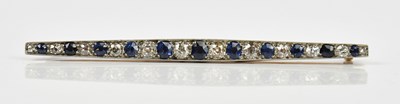 Lot 59 - A yellow and white metal diamond and sapphire...