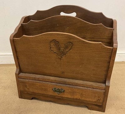 Lot 803 - ALBERT OAKROYD; an oak magazine rack with...