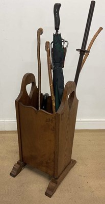 Lot 763 - ALBERT OAKROYD; an oak stickstand and sticks,...