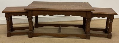 Lot 804 - A nest of three oak occasional tables, width...