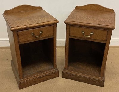 Lot 738 - ALBERT OAKROYD; a pair of oak single drawer...
