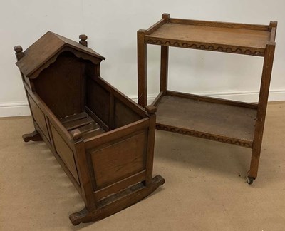 Lot 761 - An oak crib and a two tier trolley (2), crib...