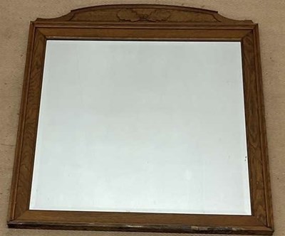 Lot 796 - ALBERT OAKROYD; an oak mirror, with bevelled...