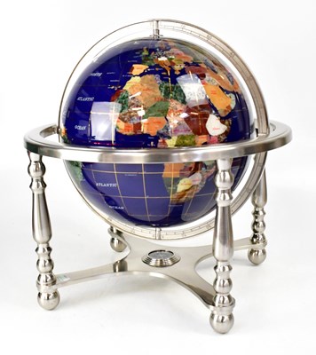 Lot 633 - A globe set with various semiprecious stones,...