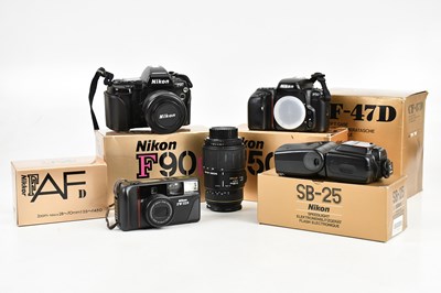 Lot 2477 - NIKON; two Nikon 35mm film cameras, including...