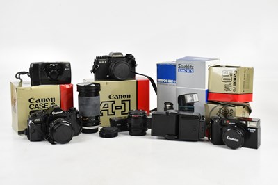 Lot 2478 - A collection of cameras and accessories, to...