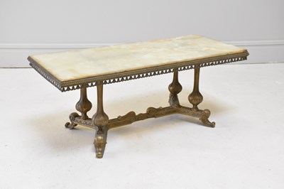 Lot 1115 - An onyx topped brass table, height 49cm, width...