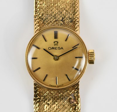Lot 591 - OMEGA; a lady's 9ct gold cased wristwatch, the...